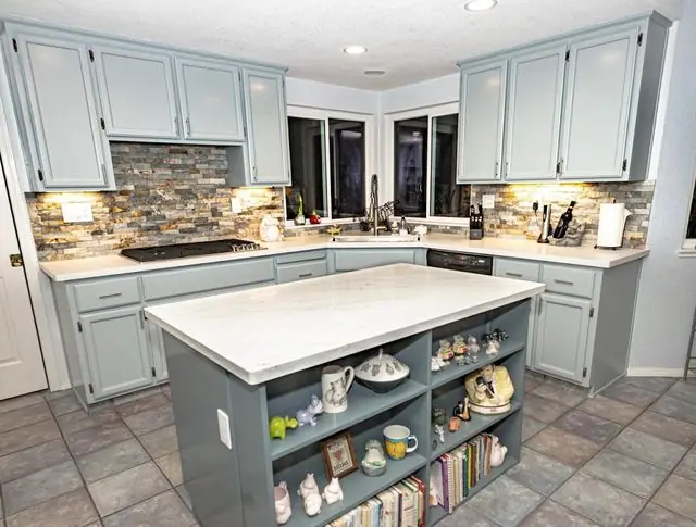 Finished sage green island kitchen