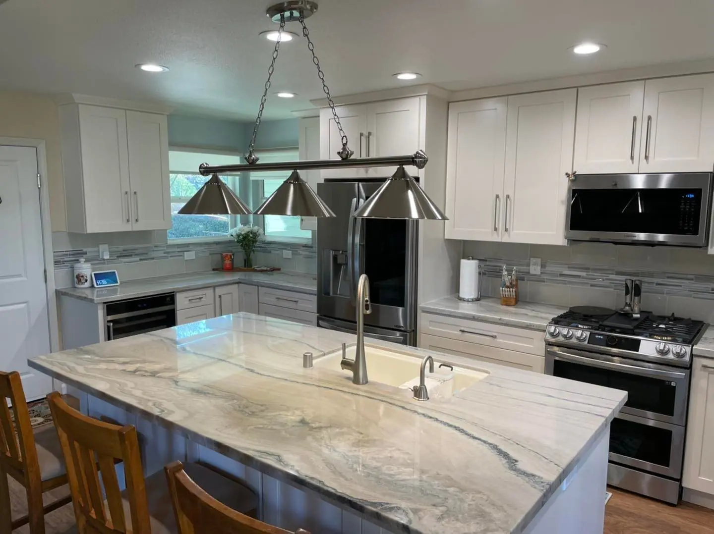 Finished white marble island kitchen