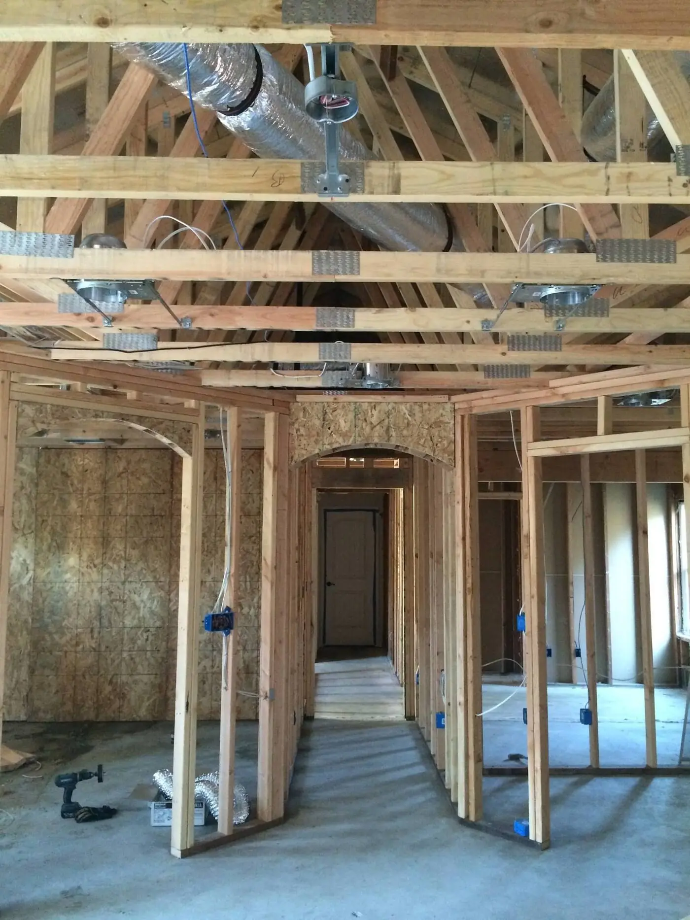 Roof truss framing on a Valley Home Construction job site